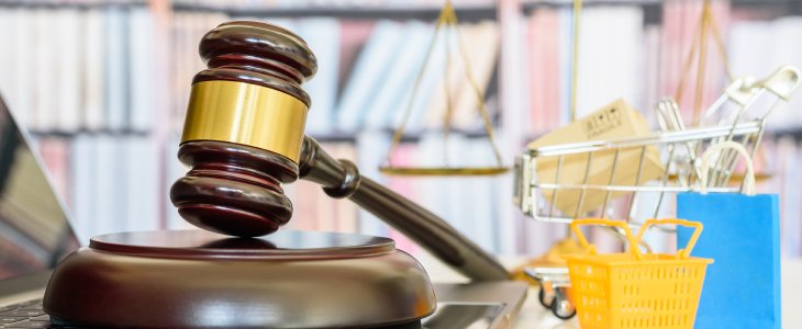 A gavel with products